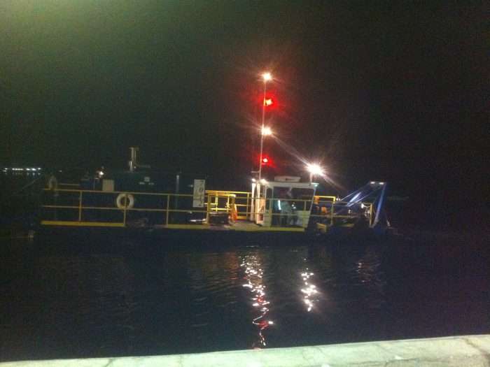 A 7012 HP Versi-Dredge cleans out a port at night in Cebu, Philippines.