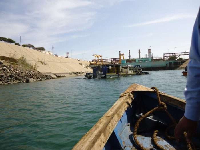 A 7012 HP Versi-Dredge dredges out an industrial canal in Mexico.