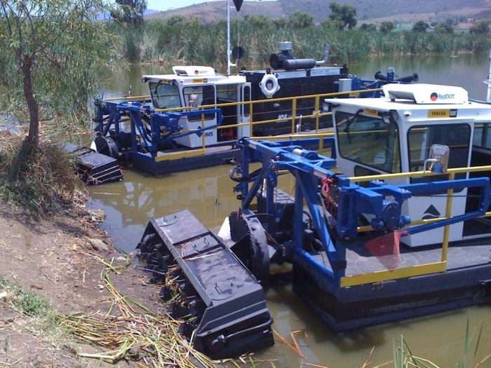 Two IMS 5012 LP Versi-Dredge units are used for dredging with the SolidsMaster cutterhead and then the WeedMaster cutterheads are installed for cutting and pumping dense cane type vegetation.