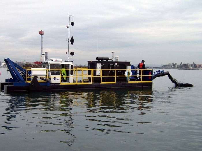 A 7012 HP Versi-Dredge operates in a Federal Navigation Channel at Marina Del Rey California.